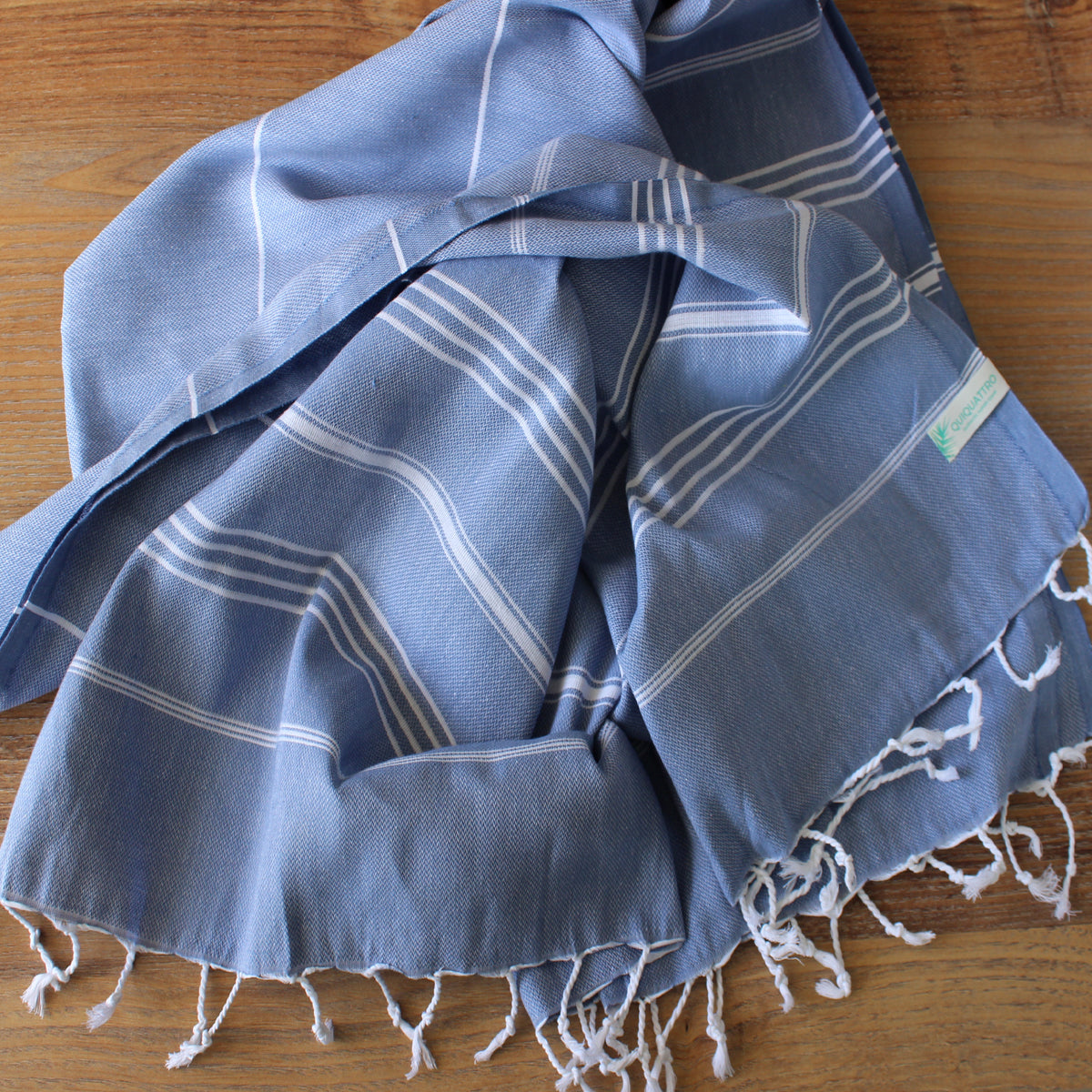 https://cdn.shopify.com/s/files/1/0622/9809/5841/products/denim_blue_turkish_towel.jpg?v=1649263674&width=1200