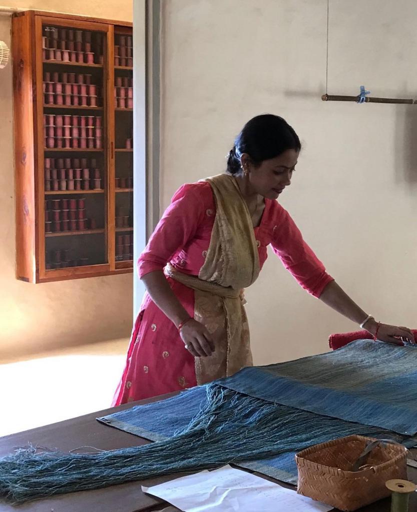 worker weaving silk