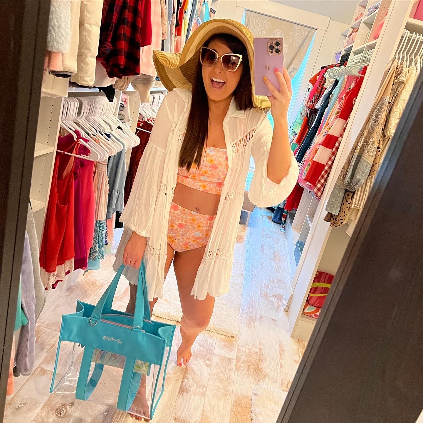 lynn lilly wearing swimsuit holding everyone tote