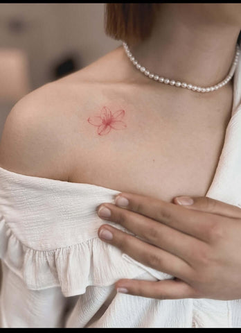 Red flower thin line tattoo