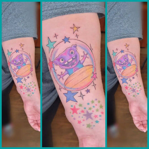 Purple alien color tattoo surrounded by stars by @nadz_illa