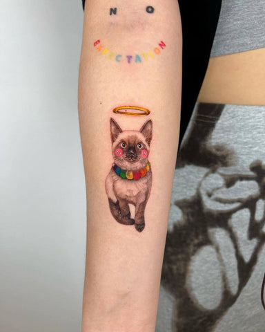 Tattoo work of the cute cat by artist@andytattoo99