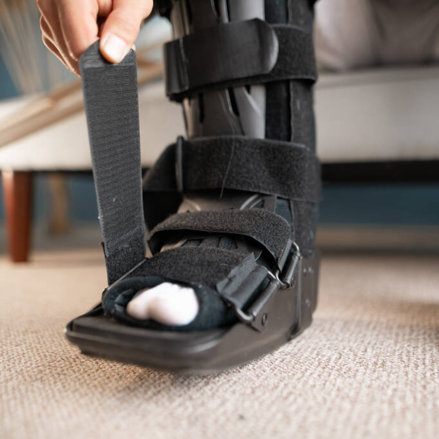 Person wearing a medical walking boot