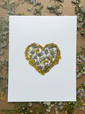 memorial wildflowers pressed into heart shape artwork