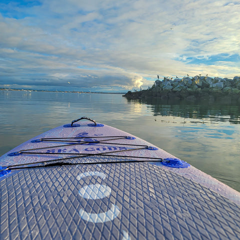 Infinite Mantra in White Rock with blue skies and calm water