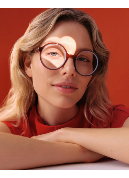 Model wearing Andy Wolf heart eyeglasses