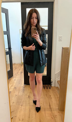 Green romper with black leather blazer