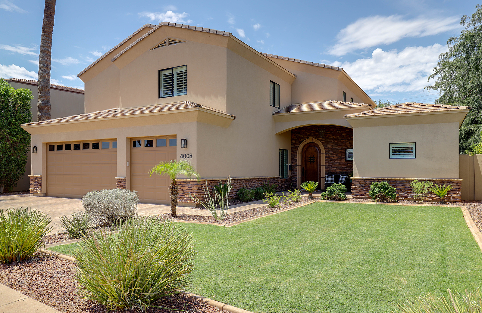 The Exterior of the Home Showing the Landscaping