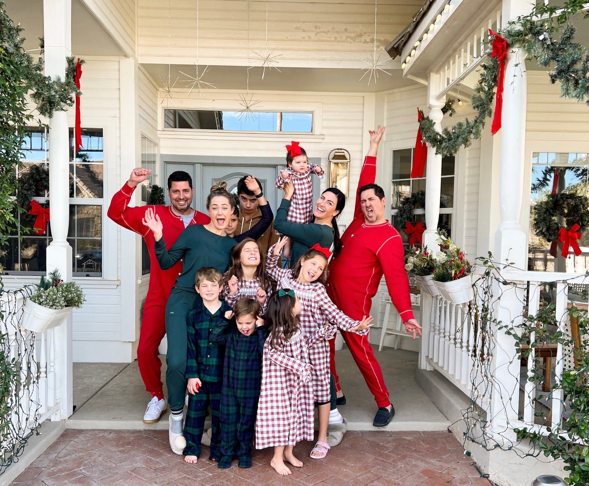 Family all on the Porch Enjoying the Christmas Decor