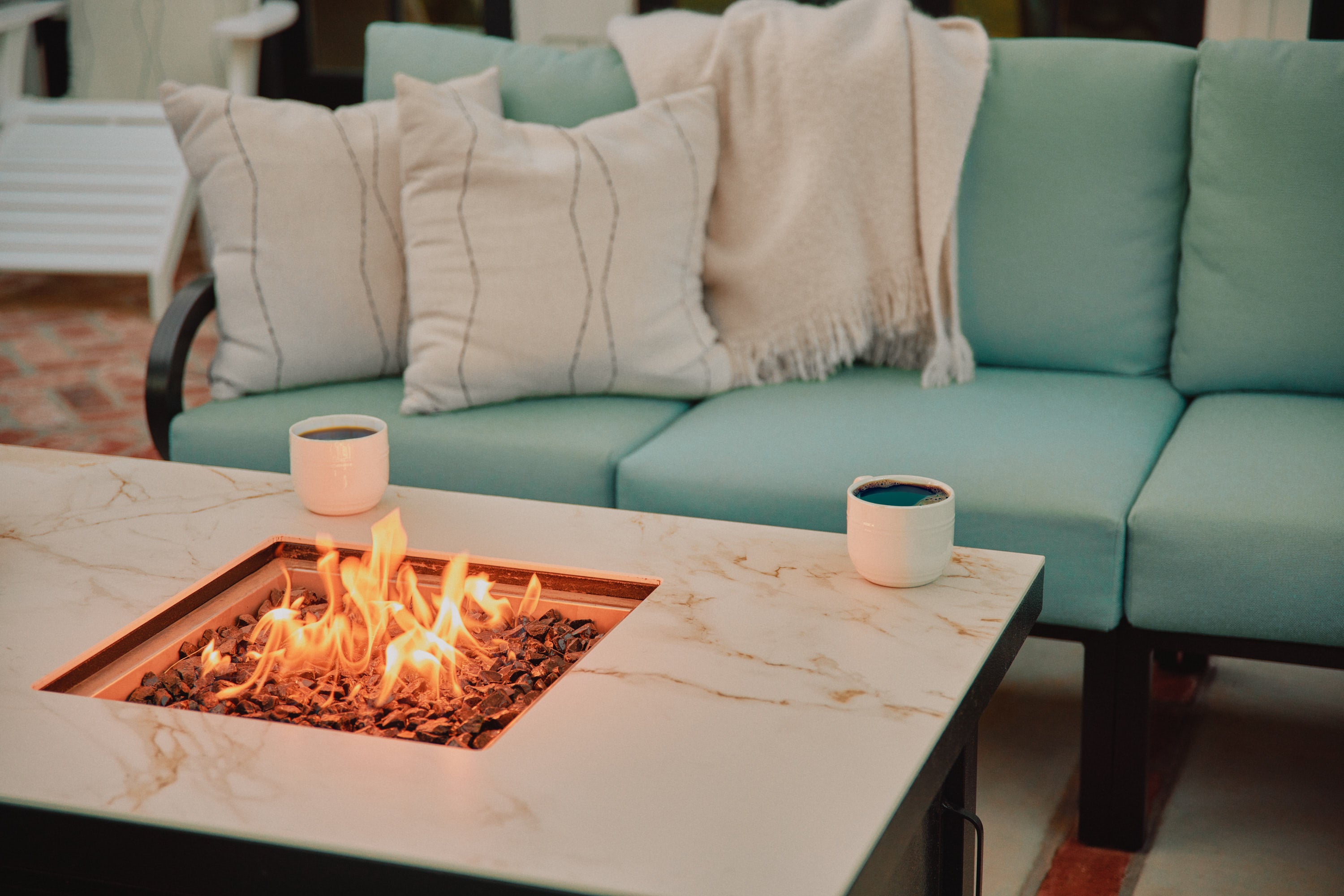 Dekton Fire Pit Table and Rancho Sectional With Bliss Spa Cushions