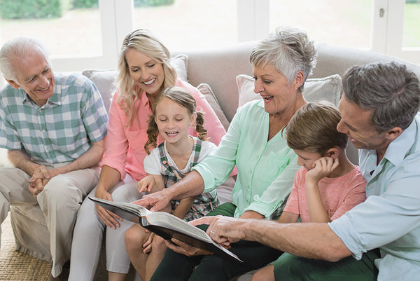 Family looking at a photo album