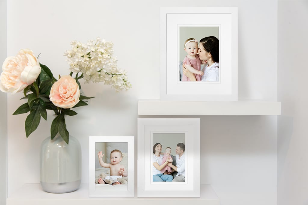 White Timber Picture Frames on a Shelf