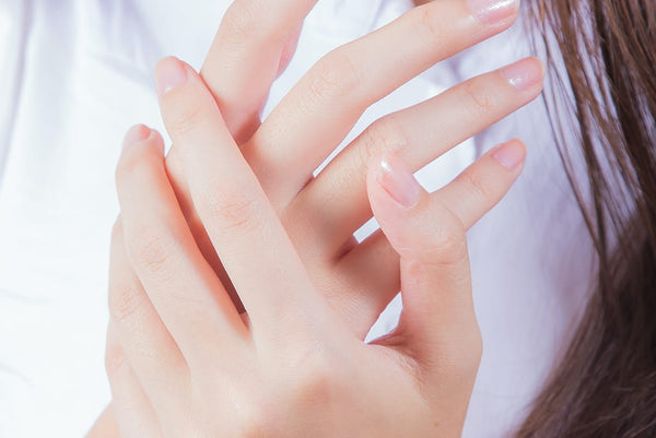 hand cream being applied to skin