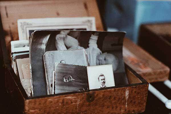 old photos in a wooden keepsake box