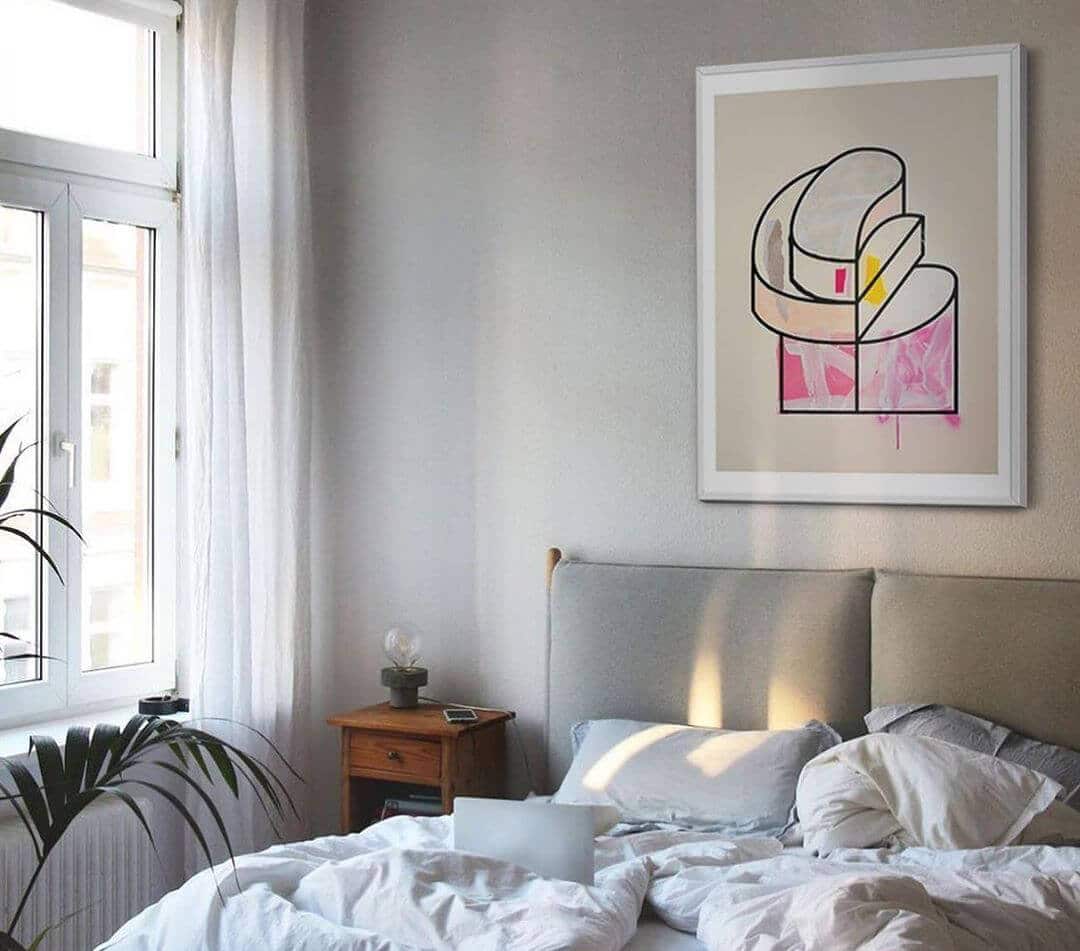 colourful bedroom with art prints
