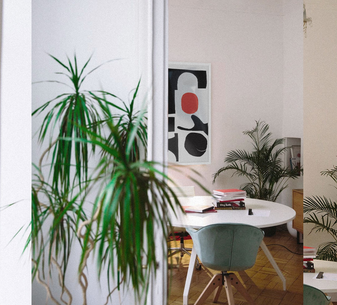 home office with plants and contemporary framed office art