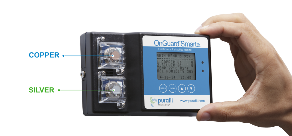 A Hand Holding an OnGuard Smart Corrosion Monitor