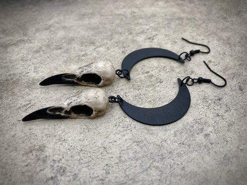 bon jewelry gothic statement earrings featuring raven skull and crescent moon phase charms