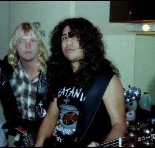Old-school Slayer Jeff Hanneman and Tom Araya backstage