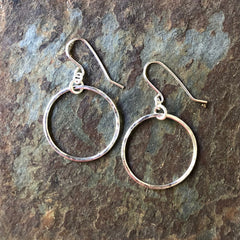 Handmade sterling silver hammered circle dangly earrings