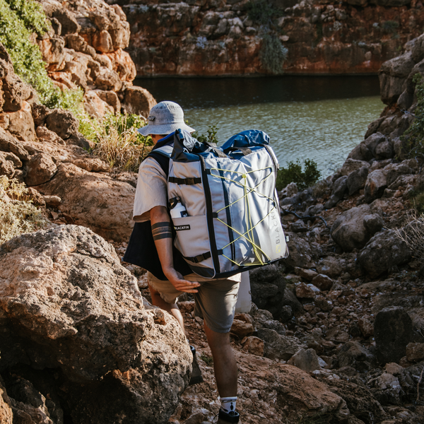 Man hiking with backpack.