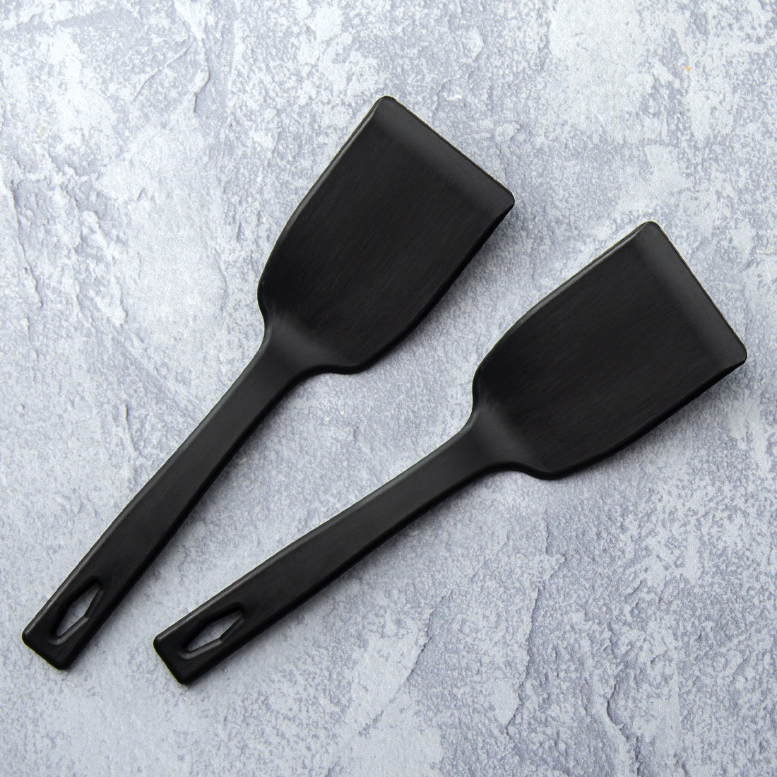 https://cdn.shopify.com/s/files/1/0623/7739/4406/products/potluck-spatula-B304-b_1600x.jpg?v=1666290540