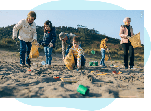 Group of people cleaning up the beach