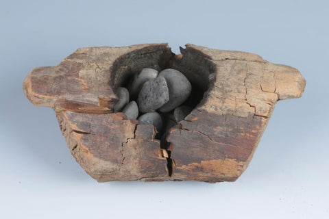 Ritual object containing charred hemp seeds found in Romanian tomb dating 5000 years old