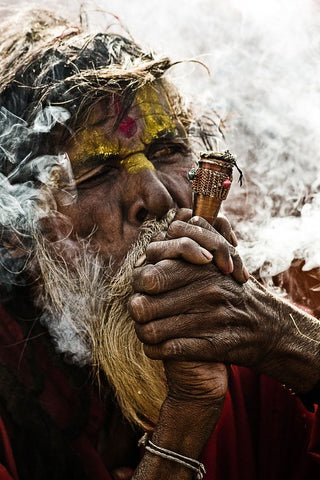 Sadhu smoking Chillum