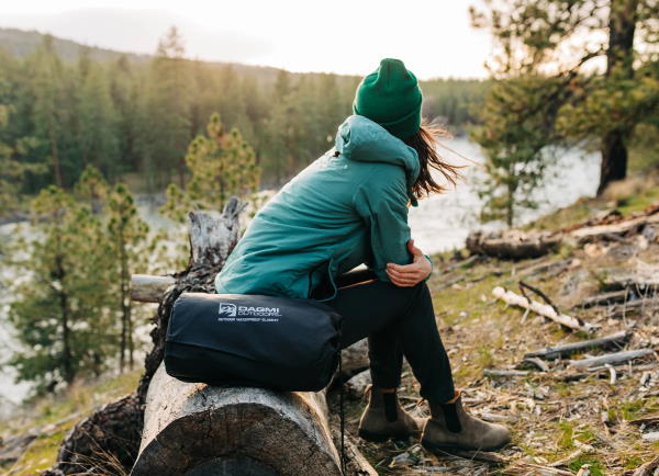 A waterproof camping blanket is an ideal tool to pack