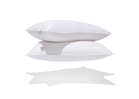 stack of 2 down perfect pillows with green label