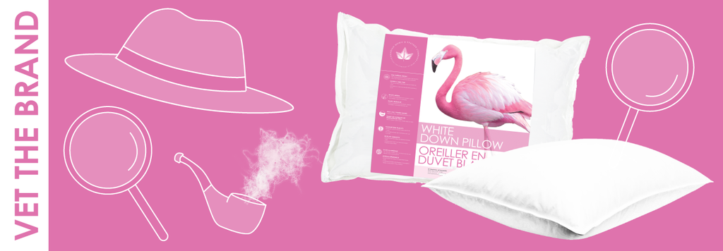 detective hat, magnifying glass and pipe with pillows on pink background 