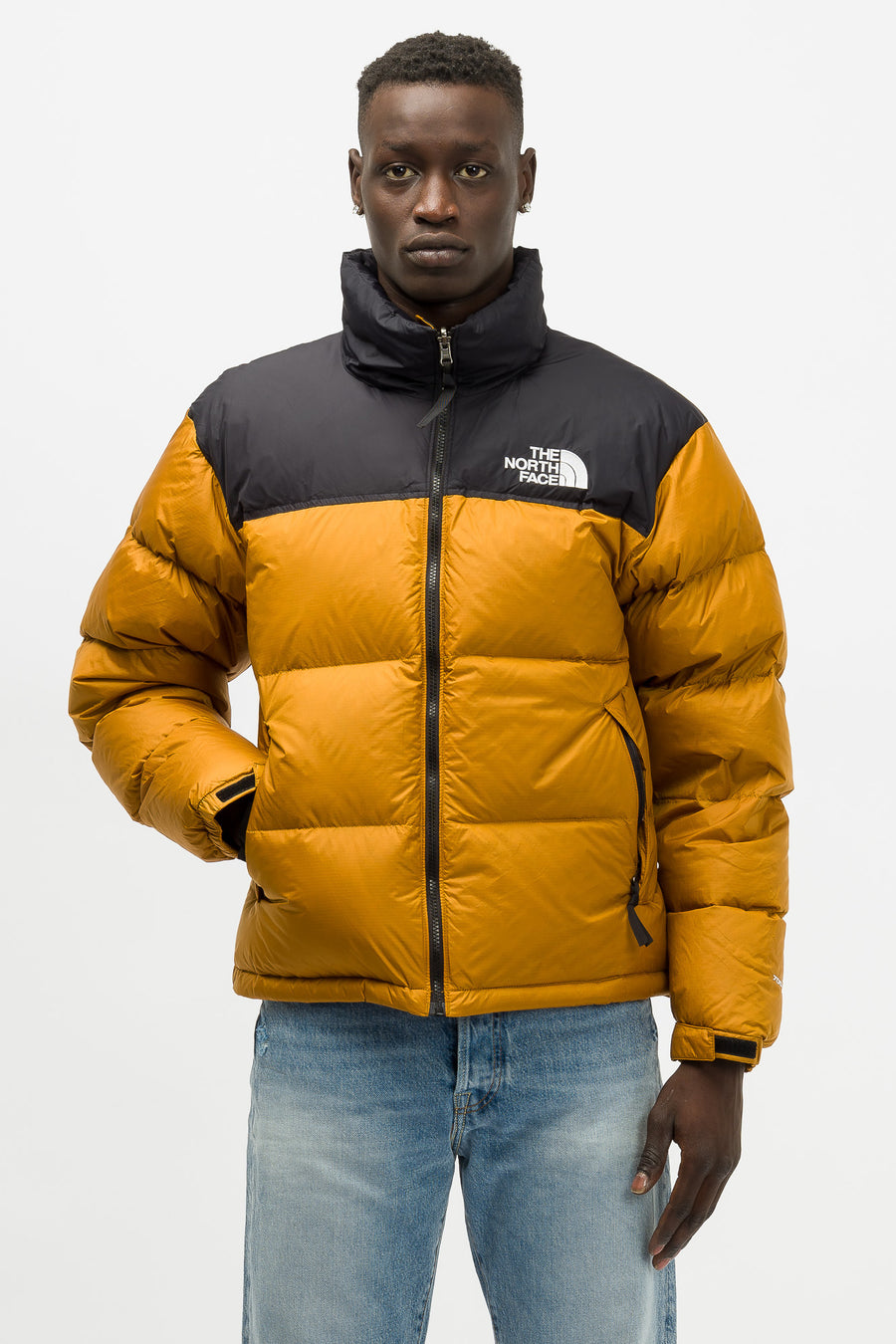 yellow and grey north face jacket