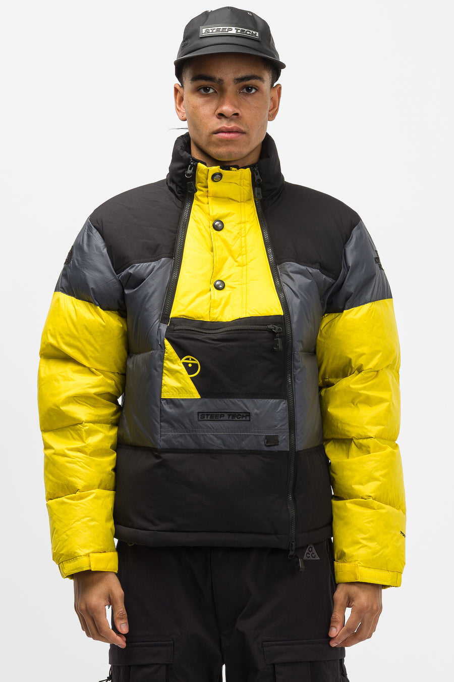 yellow and grey north face jacket