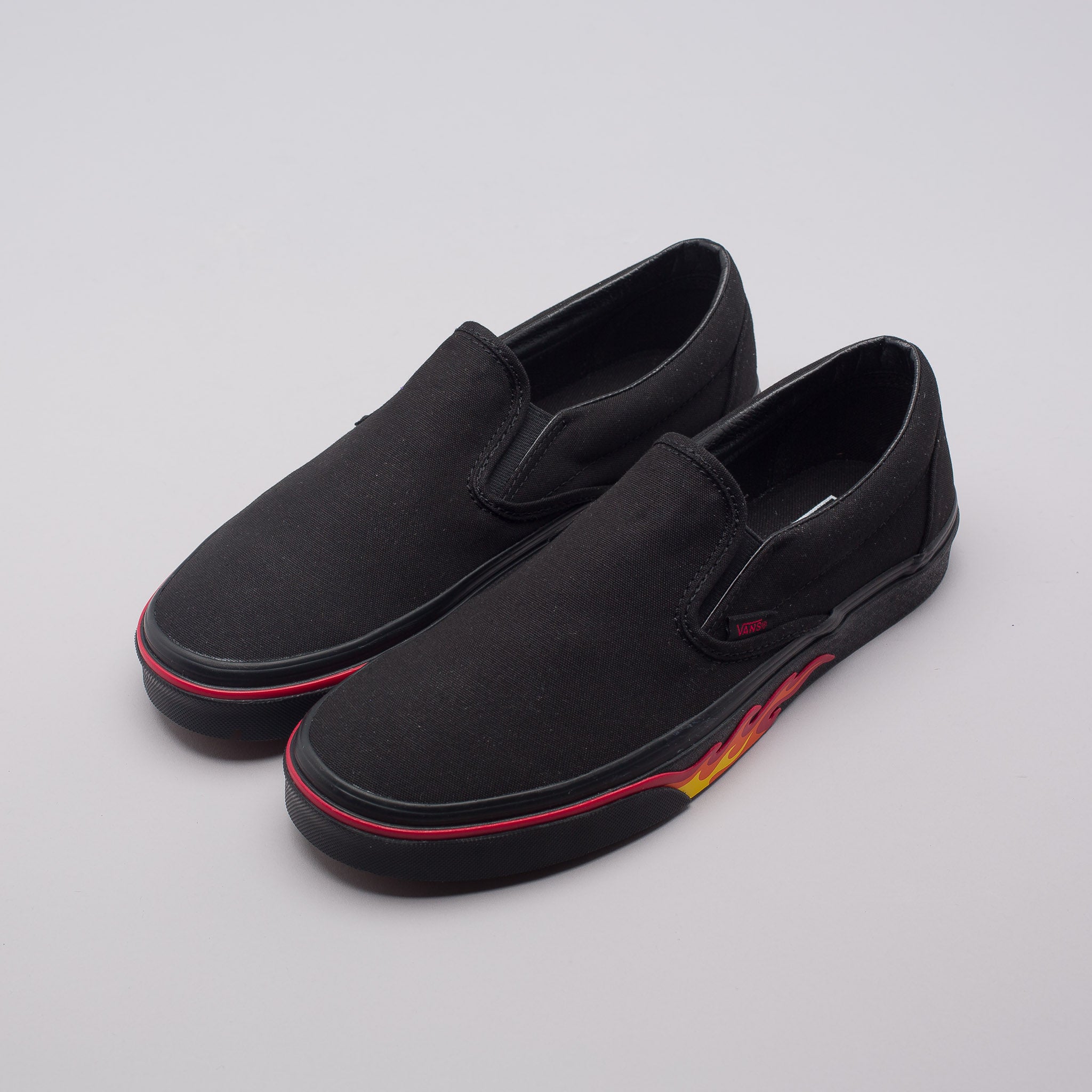 vans slip on flame wall