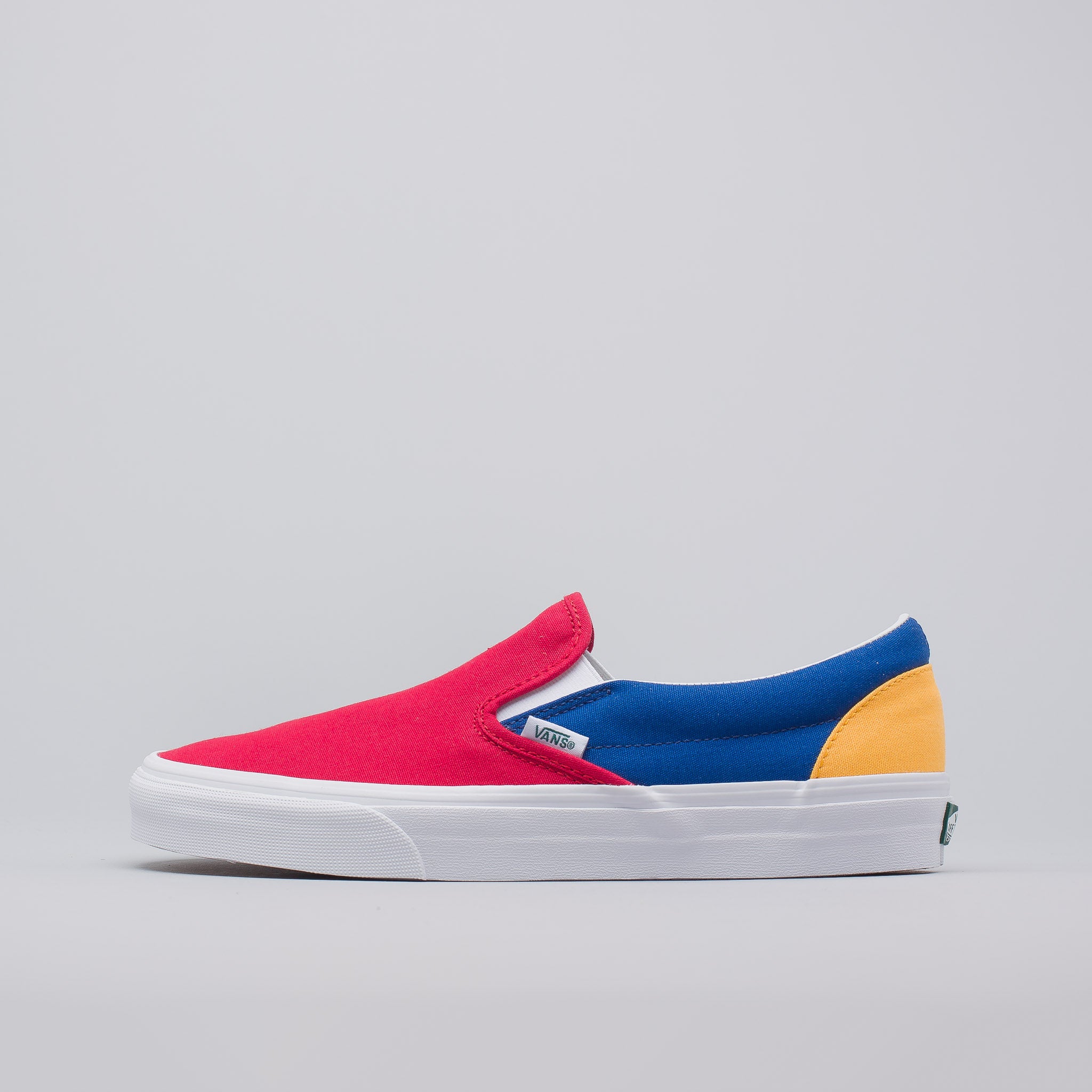 red yellow blue and green vans