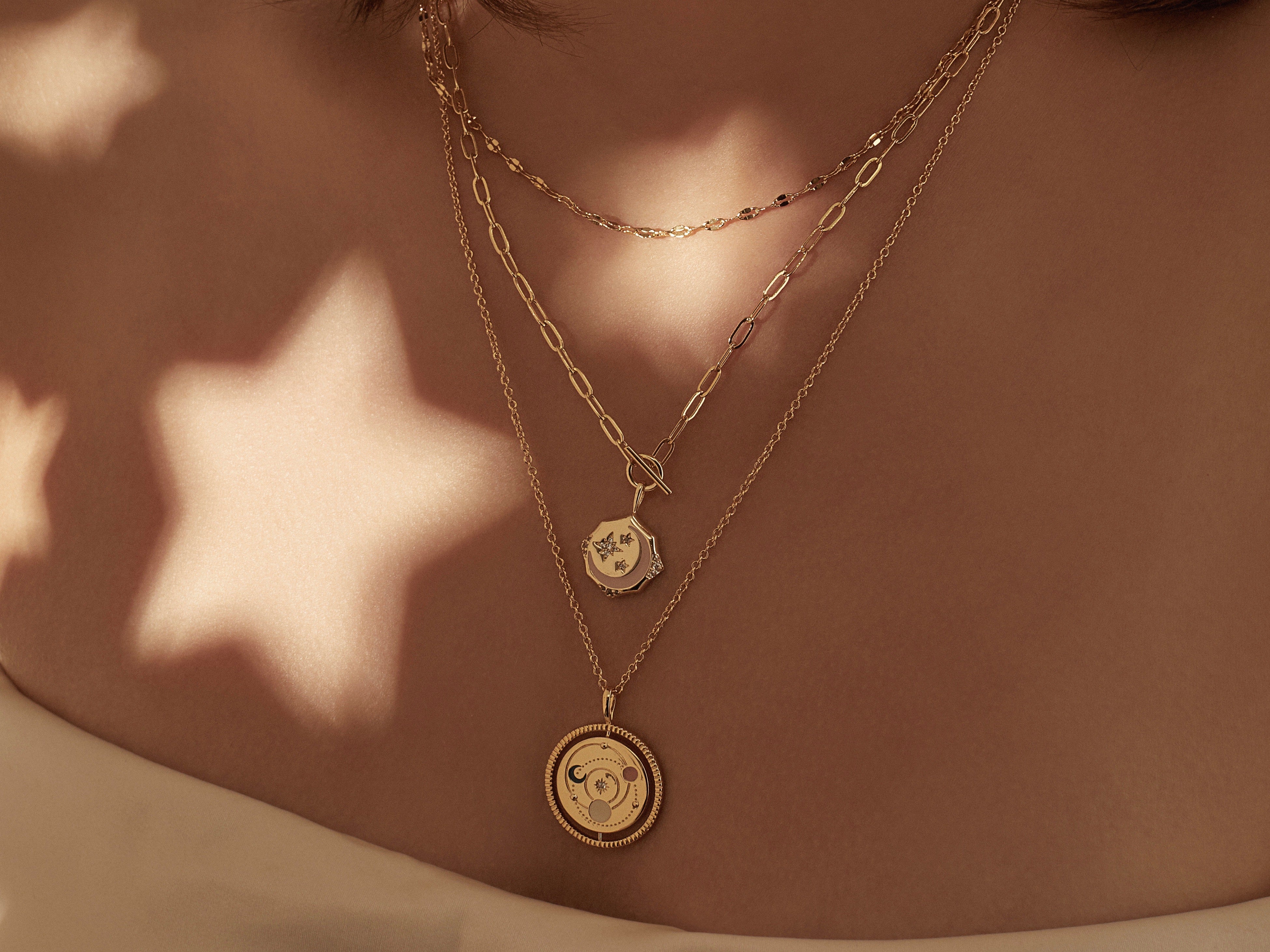 Wanderlust + Co Universe Key Pendant