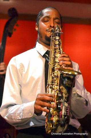 Carl Bartlett, Jr. playing saxophone - photo courtsey of Christine Connallon Photography