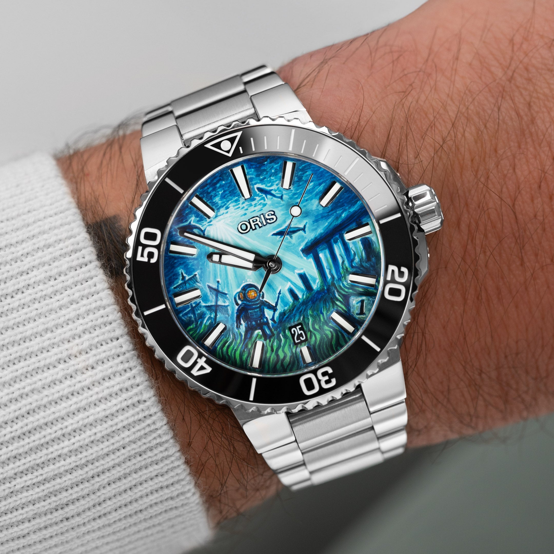 Oris Aquis Atlantis limited edition diver watch showcasing underwater exploration artistry on dial