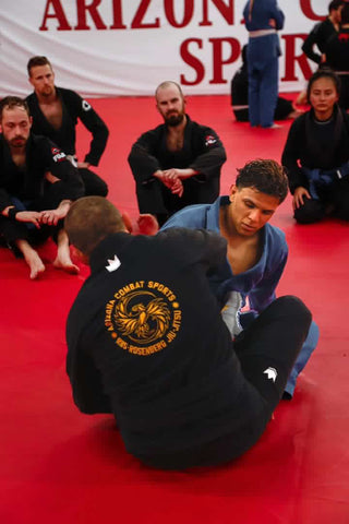 BJJ instructor teaching his students