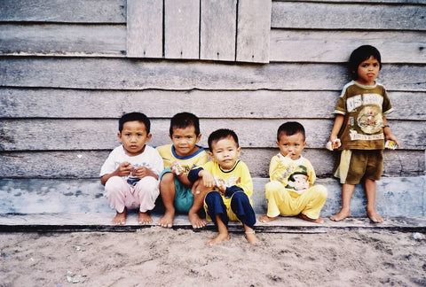 Young Children Sitting Down Taken On Canon Sure Shot A1
