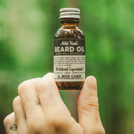 Man Holding The Mod Cabin All Natural Beard Oil