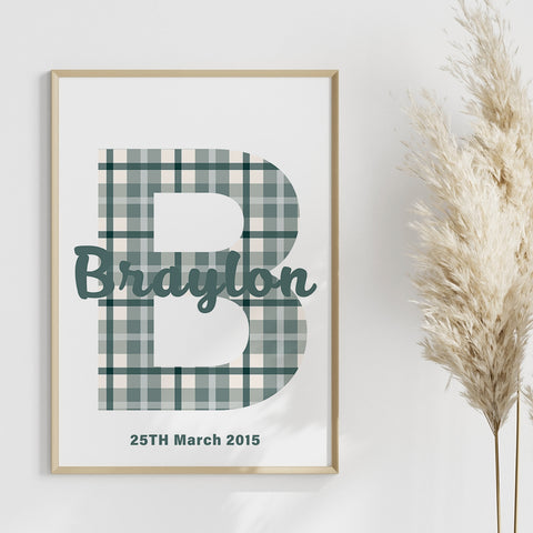 Framed wall art printable with a babies name starting with b, Braylon set against a cornflower blue gingham print.