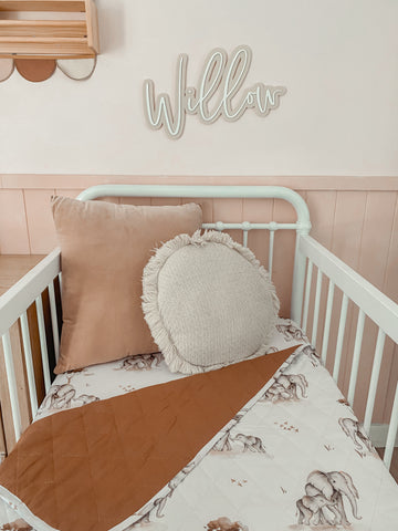 Traditional cot set with our safari quilted coverlet.