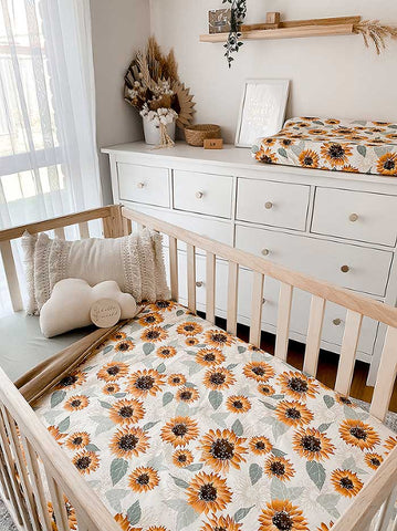 Baby Nursery with Cot featuring Snuggly Jacks Sunflowers Cot Quilt, Sage fitted sheet and Sunflowers Bassinet sheet