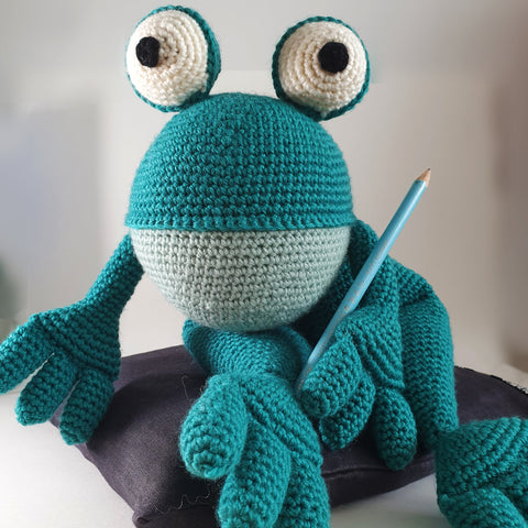 Crocheted green frog