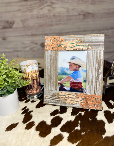 Wood picture frame with tooled leather