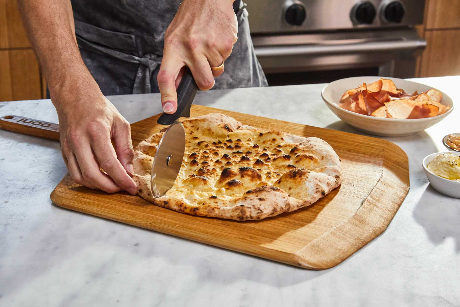 Pizza Crostini with Ricotta, Speck and Marcona Almonds