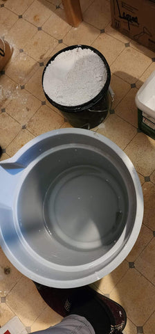 Before you weigh your plaster, put on disposable gloves and wear a mask. Measure your amounts in separate containers you are ready to make your plaster. DO NOT use old plaster (4-6 months max). Use cool water. Warm water speeds up the chemical reaction. The water bucket is always the larger containers as you put the plaster powder in the water. Always add plaster to water.