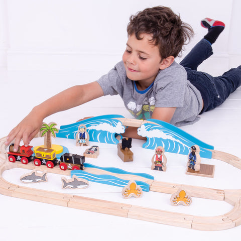 Boy playing with Pirate Train Set